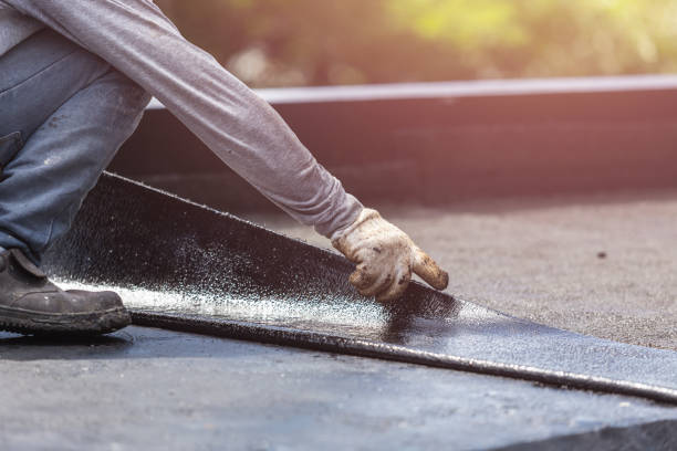 Professional Waterproofing technician working in Orange Beach, AL